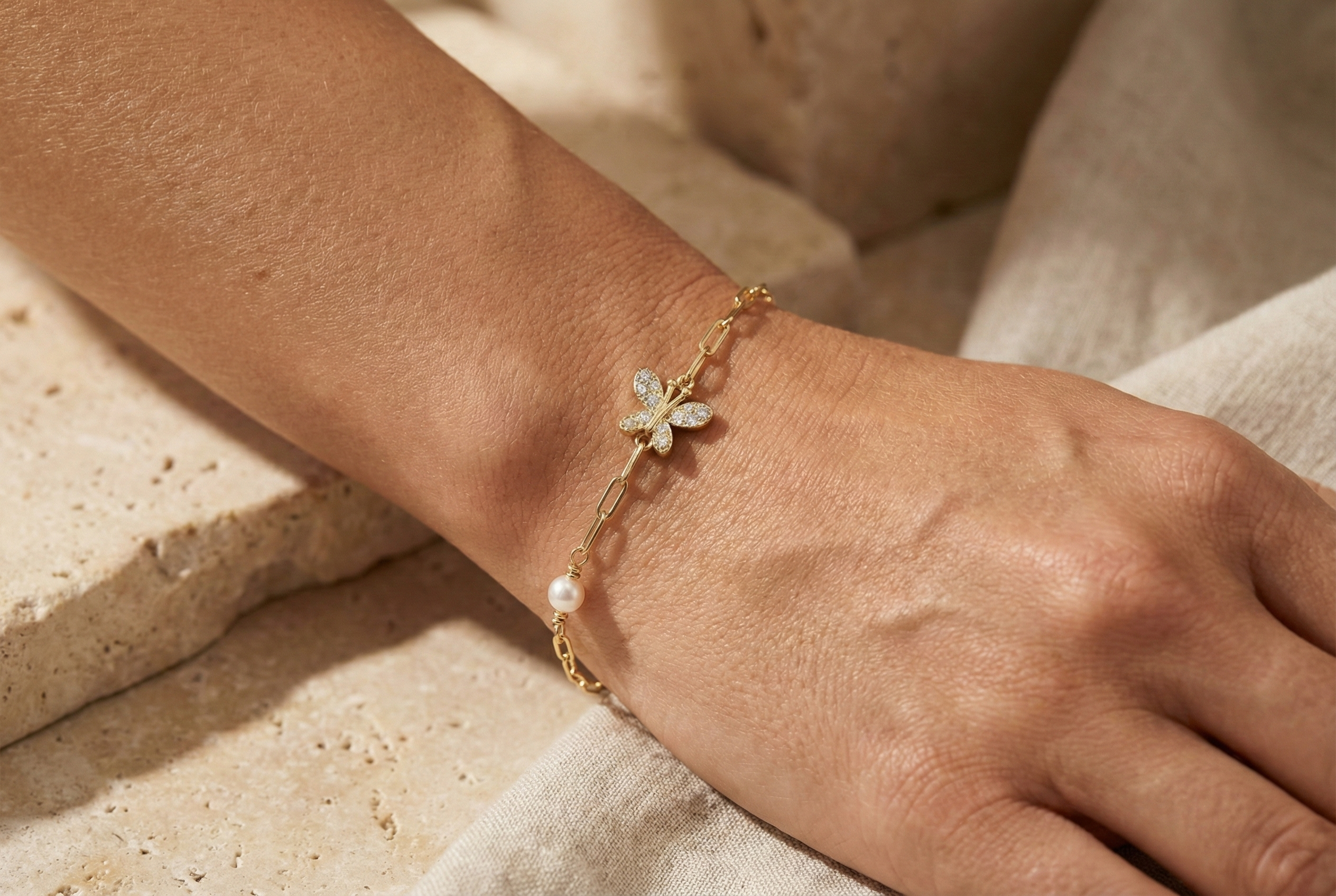 14K Gold Bracelet with Butterfly Motif and Pearl