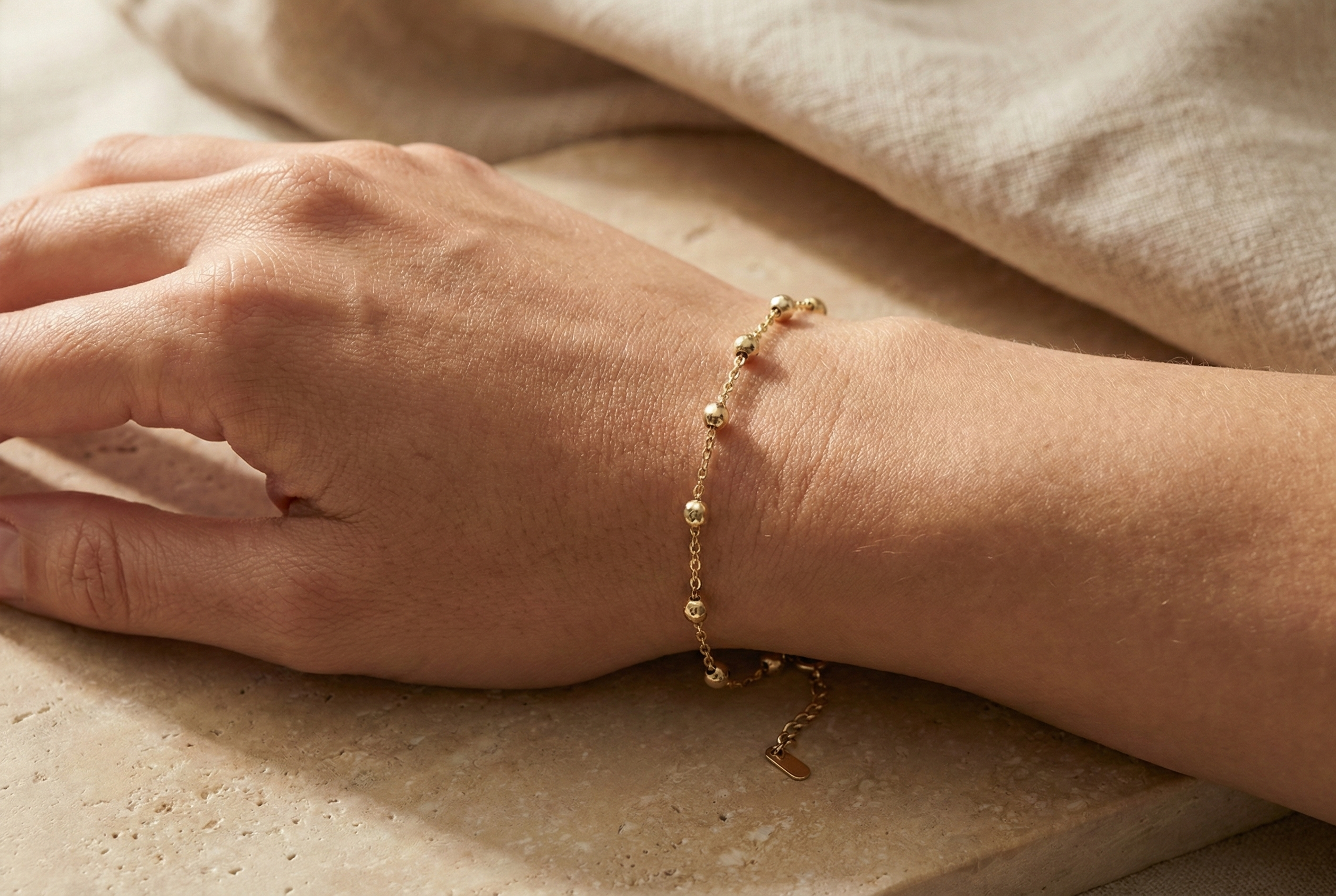 14K Gold Bracelet with Diamond-Cut Beads